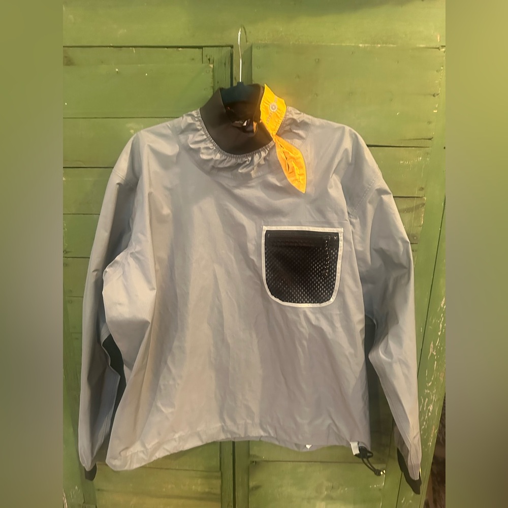 Patagonia Light Gray Pullover Jacket with Black Pocket and Yellow Accent